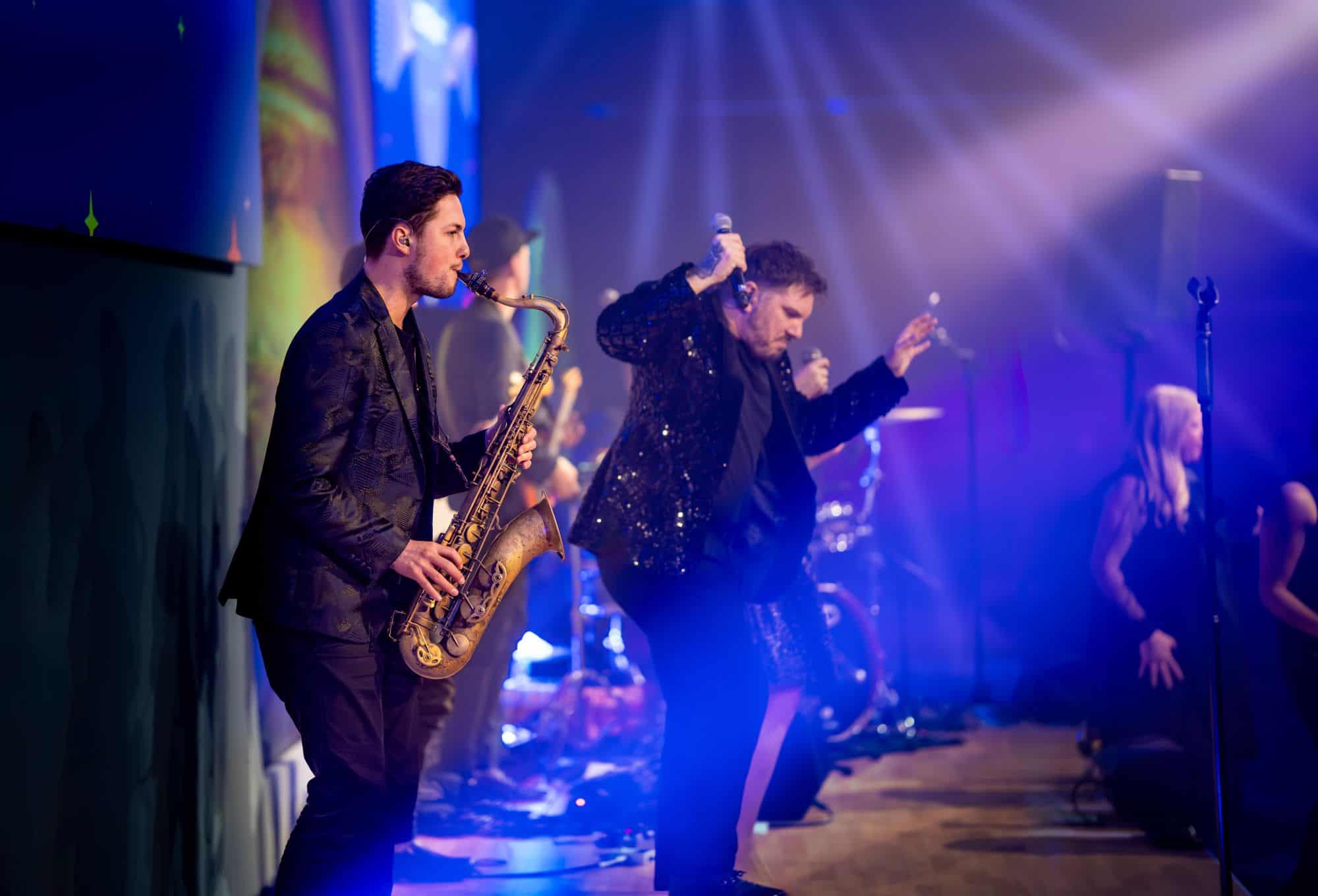 Professional musicians from Xcaliber, the top Brixton party band, entertaining guests at a London wedding or party